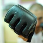 selective focus photo of black gloves